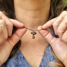 Load image into Gallery viewer, Button Mushroom Necklace Modelled by Jemica in her hands