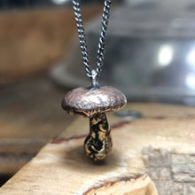 Load image into Gallery viewer, Button Mushroom Necklace close up in her studio
