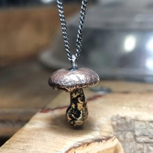Load image into Gallery viewer, Button Mushroom Necklace close up in her studio