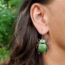 Load image into Gallery viewer, Christmas Beetle Green Drop Earrings Modelled by Jemica Side On