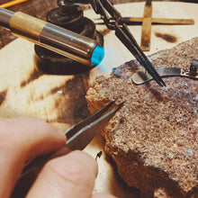 Load image into Gallery viewer, Behind the scenes look of us making HER ear cuff