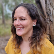 Load image into Gallery viewer, Paper Daisy Studs modelled by Jemica side view