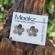 Load image into Gallery viewer, Petunia Studs on packaging card sitting on a stump