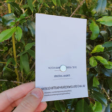 Load image into Gallery viewer, Copper Echidna Brooch on packaging card show the magnet on the back