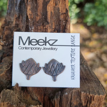 Load image into Gallery viewer, Protea Head Studs on packaging card sitting on a stump