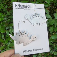 Load image into Gallery viewer, Stegosaurus Hoop Earring on Packaging Card
