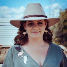 Load image into Gallery viewer, Copper Scrub Turkey with Patina modelled by Erin, also wearing Emu brooch and earrings and a kookaburra brooch