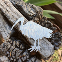 Load image into Gallery viewer, Aluminium Ibis or Bin Chicken Brooch sitting on a wooden fence