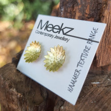 Load image into Gallery viewer, Sunflower Studs on packaging card sitting on a stump side view