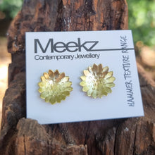 Load image into Gallery viewer, Sunflower Studs on packaging card sitting on a stump