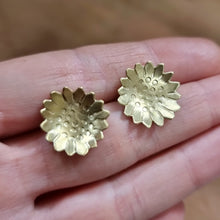 Load image into Gallery viewer, Sunflower Studs Modelled between Jemica's finger tips for size comparison