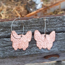 Load image into Gallery viewer, French Bulldog Head Copper Hoop Earrings sitting on a fence
