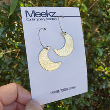Load image into Gallery viewer, Crescent moon hoop earrings on card detail