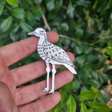 Load image into Gallery viewer, Bush Stone-Curlew Brooch Close Up on Jemica&#39;s Hand showing stamped details

