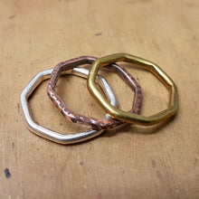 Load image into Gallery viewer, 2mm stacked octagon rings on a wooden bench

