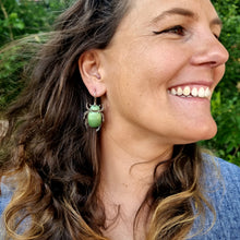 Load image into Gallery viewer, Christmas Beetle Green Drop Earrings Modelled by Jemica Side On
