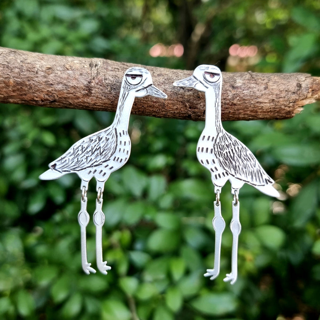 Bush Stone-Curlew Studs sitting in a branch Front Detail View