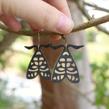 Load image into Gallery viewer, Lydia Lichen Moth Drop Earrings, Size Comparison With Hand
