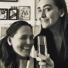 Load image into Gallery viewer, Sheridan and Jemica cheering with champagne as they finished their launch online 
