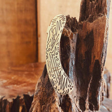 Load image into Gallery viewer, HER ear cuff close up on a wood stump
