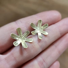 Load image into Gallery viewer, Spider Lily Studs Modelled sitting between Jemica&#39;s finger tips for size comparison
