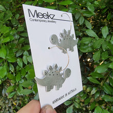 Load image into Gallery viewer, Stegosaurus Hoop Earring on Packaging Card Side View
