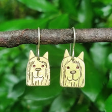 Load image into Gallery viewer, Dog Mini Head Drop Earrings Scottish Terrier in Brass on Sterling Silver Shepherd Hooks hanging on a branch
