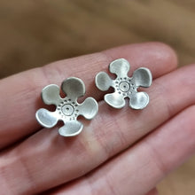 Load image into Gallery viewer, Geraldton Waxflower Studs Modelled sitting between Jemica&#39;s finger tips for size comparison
