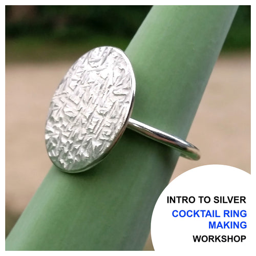 Intro to Silver Cocktail Ring Making Workshop Advertisement - sterling silver cocktail ring with cross hatch texture, photographed on a plant stem.