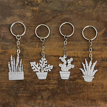 Load image into Gallery viewer, Plant Keychain - Potted Mother in Laws Tongue, Monstera, Prickly Pear Cactus and Aloe Vera
