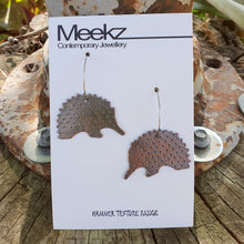 Load image into Gallery viewer, Australiana Echidna Hoop Earrings with Patina on Card Front View
