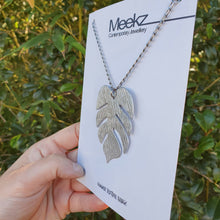 Load image into Gallery viewer, Monstera Leaf Necklace on card side view 2
