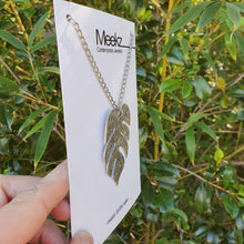 Load image into Gallery viewer, Monstera Leaf Necklace on card side view 1
