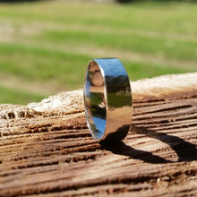 Load image into Gallery viewer, 5mm sterling silver ring beaten texture high polish modelled on a log
