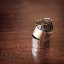 Load image into Gallery viewer, 3 x 10mm sterling silver bands stacked on top of one another on polished floor
