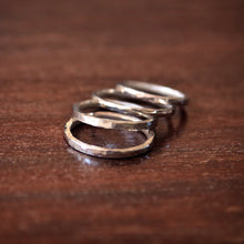 Load image into Gallery viewer, 2mm sterling silver rings stacked on one another
