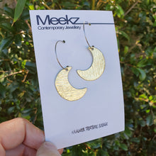 Load image into Gallery viewer, Crescent moon hoop earrings on card detail
