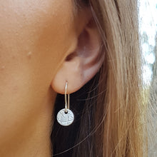 Load image into Gallery viewer, Small round drop earring aluminium multi x&#39;s modelled by Michaela
